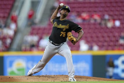 Sep 13, 2022; Cincinnati, Ohio, USA; Pittsburgh Pirates starting pitcher Luis Ortiz (75) pitches against the Cincinnati Reds in the first inning at Great American Ball Park. Mandatory Credit: Katie Stratman-USA TODAY Sports