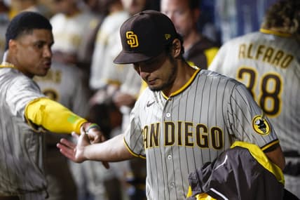 Sep 13, 2022; Seattle, Washington, USA; San Diego Padres starting pitcher Yu Darvish (right) high fives right fielder Juan Soto (22) following the eighth inning against the Seattle Mariners at T-Mobile Park. Mandatory Credit: Joe Nicholson-USA TODAY Sports