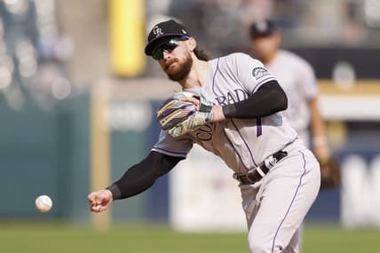 Sep 14, 2022; Chicago, Illinois, USA; Colorado Rockies second baseman Brendan Rodgers (7) throws to first base for an out against the Chicago White Sox during the sixth inning at Guaranteed Rate Field. Mandatory Credit: Kamil Krzaczynski-USA TODAY Sports