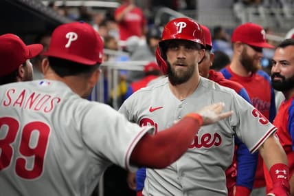Sep 14, 2022; Miami, Florida, USA; Philadelphia Phillies designated hitter Bryce Harper (3) celebrates in the dugout after hitting a solo home run in the sixth inning against the Miami Marlins at loanDepot park. Mandatory Credit: Jasen Vinlove-USA TODAY Sports
