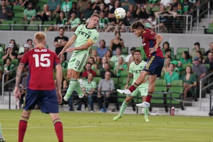 Sep 14, 2022; Austin, Texas, USA; Austin FC midfielder Alexander Ring (8) and Real Salt Lake midfielder Diego Luna (26) battle for the ball during the first half at Q2 Stadium. Mandatory Credit: Scott Wachter-USA TODAY Sports