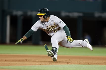 Sep 14, 2022; Arlington, Texas, USA; Oakland Athletics center fielder Ramon Laureano (22) dives into second base with a double in the fifth inning against the Texas Rangers at Globe Life Field. Mandatory Credit: Tim Heitman-USA TODAY Sports
