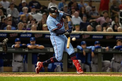Sep 14, 2022; Minneapolis, Minnesota, USA; Minnesota Twins shortstop Carlos Correa (4) hits a double during the seventh inning against the Kansas City Royals at Target Field. Mandatory Credit: Jordan Johnson-USA TODAY Sports