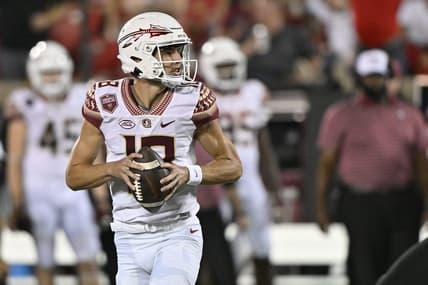 Sep 16, 2022; Louisville, Kentucky, USA; Florida State Seminoles quarterback Tate Rodemaker (18) looks to pass against the Louisville Cardinals during the second quarter at Cardinal Stadium. Mandatory Credit: Jamie Rhodes-USA TODAY Sports