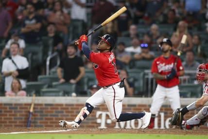 Sep 16, 2022; Atlanta, Georgia, USA; Atlanta Braves second baseman Ozzie Albies (1) hits a two run RBI double against the Philadelphia Phillies in the eighth inning at Truist Park. Mandatory Credit: Brett Davis-USA TODAY Sports