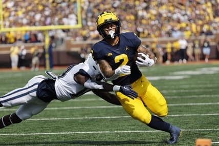 Sep 17, 2022; Ann Arbor, Michigan, USA;  Michigan Wolverines running back Blake Corum (2) rushes in the first half against the Connecticut Huskies at Michigan Stadium. Mandatory Credit: Rick Osentoski-USA TODAY Sports