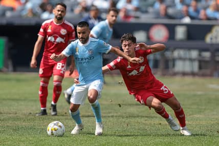 Sep 17, 2022; New York, New York, USA; New York City FC midfielder Maximiliano Moralez (10) plays the ball as New York Red Bulls midfielder Caden Clark (37) defends during the first half at Yankee Stadium. Mandatory Credit: Vincent Carchietta-USA TODAY Sports