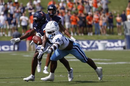 Sep 17, 2022; Charlottesville, Virginia, USA; Virginia Cavaliers wide receiver Dontayvion Wicks (3) attempts to make a catch as Old Dominion Monarchs cornerback Tobias Harris (20) defends during the first quarter at Scott Stadium. Mandatory Credit: Geoff Burke-USA TODAY Sports