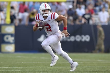 Sep 17, 2022; Atlanta, Georgia, USA; Mississippi Rebels quarterback Jaxson Dart (2) scrambles against the Georgia Tech Yellow Jackets in the second quarter at Bobby Dodd Stadium. Mandatory Credit: Brett Davis-USA TODAY Sports