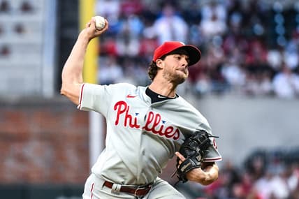 Sep 17, 2022; Cumberland, Georgia, USA; Philadelphia Phillies starting pitcher Aaron Nola (27) throws a strike in the first inning against the Atlanta Braves at Truist Park. Mandatory Credit: Larry Robinson-USA TODAY Sports