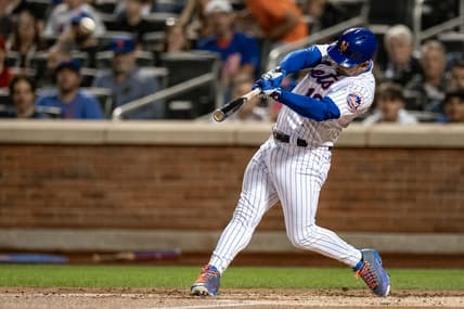 Sep 17, 2022; New York City, New York, USA; New York Mets third baseman Eduardo Escobar (10) hits a three run home run against the Pittsburgh Pirates during the second inning at Citi Field. Mandatory Credit: John Jones-USA TODAY Sports