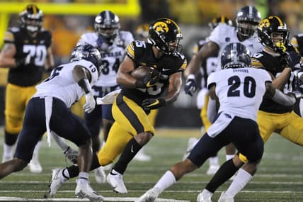 Sep 17, 2022; Iowa City, Iowa, USA; Iowa Hawkeyes running back Gavin Williams (25) runs the ball against the Nevada Wolf Pack during the second quarter at Kinnick Stadium. Mandatory Credit: Jeffrey Becker-USA TODAY Sports