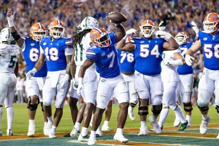 Florida Gators running back Trevor Etienne (7) rushes with the ball for a touchdown during the second half against the South Florida Bulls at Steve Spurrier Field at Ben Hill Griffin Stadium in Gainesville, FL on Saturday, September 17, 2022. [Matt Pendleton/Gainesville Sun]

Ncaa Football Florida Gators Vs South Florida Bulls