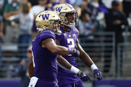 Sep 17, 2022; Seattle, Washington, USA; Washington Huskies wide receiver Ja'Lynn Polk (2) celebrates with wide receiver Rome Odunze (1) after catching a touchdown pass against the Michigan State Spartans during the first quarter at Alaska Airlines Field at Husky Stadium. Mandatory Credit: Joe Nicholson-USA TODAY Sports
