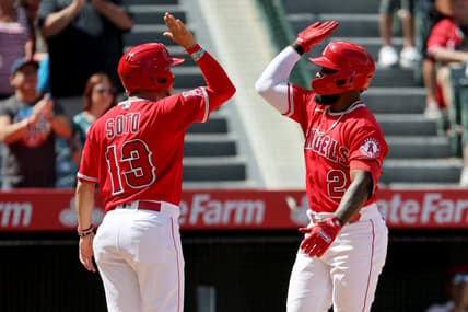 Sep 18, 2022; Anaheim, California, USA;  Los Angeles Angels third baseman Luis Rengifo (2) celebrates with shortstop Livan Soto (13) after hitting a second home run of the game during the third inning against the Seattle Mariners at Angel Stadium. Mandatory Credit: Kiyoshi Mio-USA TODAY Sports