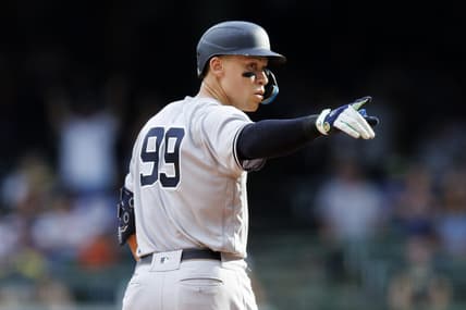 Sep 18, 2022; Milwaukee, Wisconsin, USA;  New York Yankees center fielder Aaron Judge (99) gestures after hitting an RBI double during the ninth inning against the Milwaukee Brewers at American Family Field. Mandatory Credit: Jeff Hanisch-USA TODAY Sports