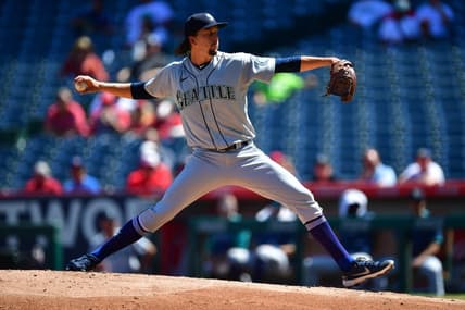 Sep 19, 2022; Anaheim, California, USA; Seattle Mariners starting pitcher Logan Gilbert (36) throws against the Los Angeles Angels during the first inning at Angel Stadium. Mandatory Credit: Gary A. Vasquez-USA TODAY Sports