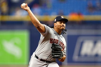 Sep 19, 2022; St. Petersburg, Florida, USA;  Houston Astros starting pitcher Luis Garcia (77) throws a pitch against the Tampa Bay Rays in the first inning at Tropicana Field. Mandatory Credit: Nathan Ray Seebeck-USA TODAY Sports