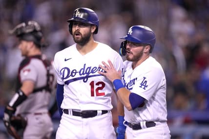 Sep 19, 2022; Los Angeles, California, USA; Los Angeles Dodgers left fielder Joey Gallo (12) and second baseman Gavin Lux (9) celebrate after scoring in the fourth inning against the Arizona Diamondbacks at Dodger Stadium. Mandatory Credit: Kirby Lee-USA TODAY Sports
