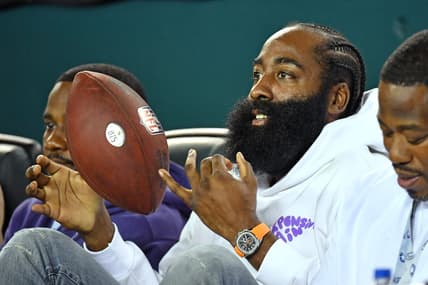 Sep 19, 2022; Philadelphia, Pennsylvania, USA; Philadelphia 76ers guard James Harden with the football that was given to him from Philadelphia Eagles cornerback Darius Slay (2) after he intercepted a pass against the Minnesota Vikings Lincoln Financial Field. Mandatory Credit: Eric Hartline-USA TODAY Sports