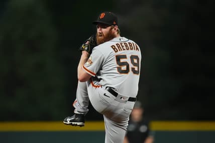 Sep 20, 2022; Denver, Colorado, USA; San Francisco Giants relief pitcher John Brebbia (59) pitches in the first inning against the Colorado Rockies at Coors Field. Mandatory Credit: Ron Chenoy-USA TODAY Sports