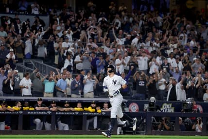 Sep 20, 2022; Bronx, New York, USA; New York Yankees right fielder Aaron Judge (99) rounds the bases after hitting his 60th home run of the season during the ninth inning against the Pittsburgh Pirates at Yankee Stadium. Mandatory Credit: Brad Penner-USA TODAY Sports
