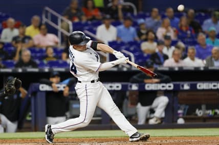 Sep 21, 2022; Miami, Florida, USA; Miami Marlins catcher Nick Fortes (54) hits a two-run home run during the fifth inning against the Chicago Cubs at loanDepot Park. Mandatory Credit: Sam Navarro-USA TODAY Sports