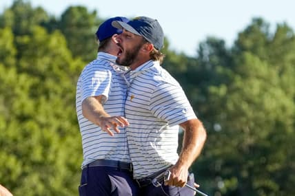 Sep 23, 2022; Charlotte, North Carolina, USA; Team USA golfer Max Homa celebrates on the 18th green during the four-ball match play of the Presidents Cup golf tournament at Quail Hollow Club. Mandatory Credit: Jim Dedmon-USA TODAY Sports