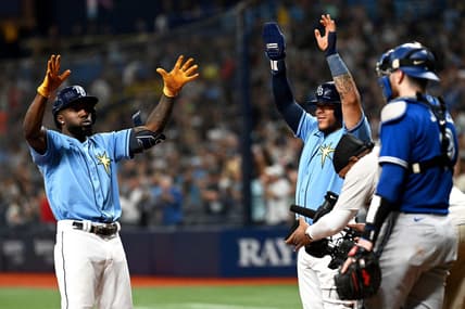Sep 23, 2022; St. Petersburg, Florida, USA; Tampa Bay Rays left fielder Randy Arozarena (left) and designated hitter Harold Ramirez (43) celebrate after scoring in the fifth inning against the Toronto Blue Jays at Tropicana Field. Mandatory Credit: Jonathan Dyer-USA TODAY Sports