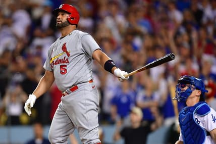 Sep 23, 2022; Los Angeles, California, USA; St. Louis Cardinals designated hitter Albert Pujols (5) hits a three run home run and the 700th of his career against the Los Angeles Dodgers during the fourth inning at Dodger Stadium. Mandatory Credit: Gary A. Vasquez-USA TODAY Sports