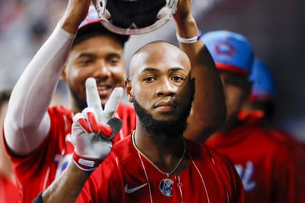 Sep 24, 2022; Miami, Florida, USA; Miami Marlins center fielder Bryan De La Cruz (14) reacts in the dugout after hitting a home run against the Washington Nationals during the fourth inning at loanDepot Park. Mandatory Credit: Sam Navarro-USA TODAY Sports