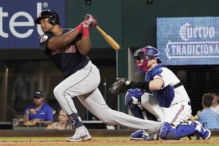Sep 24, 2022; Arlington, Texas, USA; Cleveland Guardians right fielder Oscar Gonzalez (39) follows thru on a solo home run during the fifth inning against the Texas Rangers at Globe Life Field. Mandatory Credit: Raymond Carlin III-USA TODAY Sports
