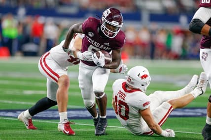 Sep 24, 2022; Arlington, Texas, USA; Texas A&M Aggies running back Devon Achane (6) rushes the ball against the Arkansas Razorbacks during the first quarter at AT&T Stadium. Mandatory Credit: Andrew Dieb-USA TODAY Sports