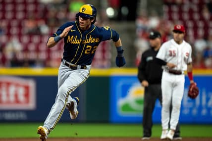 Milwaukee Brewers left fielder Christian Yelich (22) heads towards third before scoring from first on an RBI double hit by Milwaukee Brewers shortstop Willy Adames (27) in the seventh inning of the MLB game between the Cincinnati Reds and the Milwaukee Brewers at Great American Ball Park in Cincinnati on Saturday, Sept. 24, 2022.

Milwaukee Brewers At Cincinnati Reds 158
