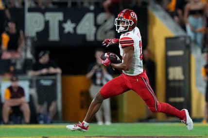 Sep 24, 2022; Tempe, Arizona, USA; Utah Utes wide receiver Devaughn Vele (17) runs after a catch against the Arizona State Sun Devils during the first half at Sun Devil Stadium. Mandatory Credit: Joe Camporeale-USA TODAY Sports