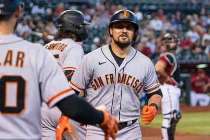 Sep 25, 2022; Phoenix, Arizona, USA; San Francisco Giants infielder J.D. Davis (7) celebrates after hitting a solo home run in the ninth inning against the Arizona Diamondbacks at Chase Field. Mandatory Credit: Allan Henry-USA TODAY Sports