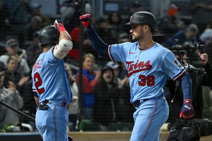 Sep 27, 2022; Minneapolis, Minnesota, USA;  Minnesota Twins outfielder Matt Wallner (38) celebrates his two-run home run against the Chicago White Sox with infielder Luis Arraez (2) during the sixth inning at Target Field. Mandatory Credit: Nick Wosika-USA TODAY Sports