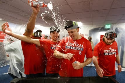 Sep 27, 2022; Milwaukee, Wisconsin, USA;  The St. Louis Cardinals celebrate winning the National League Central Division by defeating the Milwaukee Brewers at American Family Field. Mandatory Credit: Jeff Hanisch-USA TODAY Sports