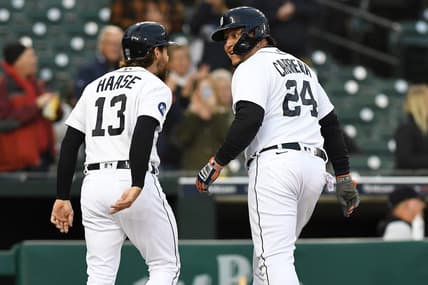 Sep 28, 2022; Detroit, Michigan, USA; Detroit Tigers designated hitter Miguel Cabrera (24) celebrates with catcher Eric Haase (13) after driving him in after hitting a two-run home run off Kansas City Royals starting pitcher Daniel Lynch (not pictured) in the second inning at Comerica Park. Mandatory Credit: Lon Horwedel-USA TODAY Sports