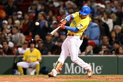 Sep 28, 2022; Boston, Massachusetts, USA; Boston Red Sox left fielder Alex Verdugo (99) hits a solo home run against the Baltimore Orioles during the sixth inning at Fenway Park. Mandatory Credit: Brian Fluharty-USA TODAY Sports
