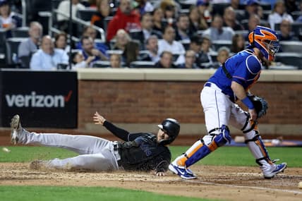 Sep 28, 2022; New York City, New York, USA; Miami Marlins second baseman Charles Leblanc (83) scores against New York Mets catcher Tomas Nido (3) on a double by Marlins right fielder Brian Anderson (not pictured) during the seventh inning at Citi Field. Mandatory Credit: Brad Penner-USA TODAY Sports