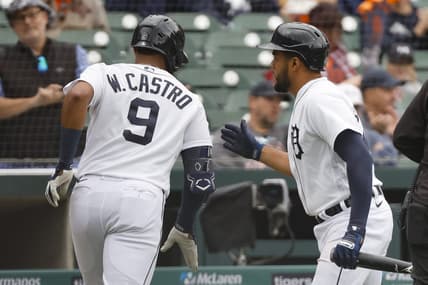 Sep 29, 2022; Detroit, Michigan, USA;  Detroit Tigers right fielder Willi Castro (9) receives congratulations from third baseman Jeimer Candelario (46) after he hits a home run in the second inning against the Kansas City Royals at Comerica Park. Mandatory Credit: Rick Osentoski-USA TODAY Sports