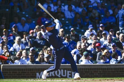 Sep 30, 2022; Chicago, Illinois, USA;  Chicago Cubs shortstop Nico Hoerner (2) hits a two run double against the Cincinnati Reds during the second inning at Wrigley Field. Mandatory Credit: Matt Marton-USA TODAY Sports
