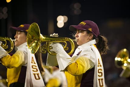 A member of the Arizona State University marching band plays a trumpet during a halftime show at Sun Devil Stadium in Tempe on Oct. 8, 2021. Monica D. Spencer/The Republic 6029647001

Asu Stanford Football Game 6029647001 10