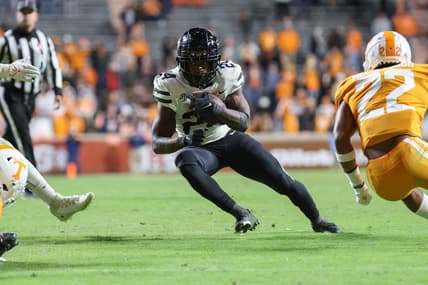 Nov 27, 2021; Knoxville, Tennessee, USA; Vanderbilt Commodores running back Rocko Griffin (24) runs the ball against the Tennessee Volunteers during the second half at Neyland Stadium. Mandatory Credit: Randy Sartin-USA TODAY Sports