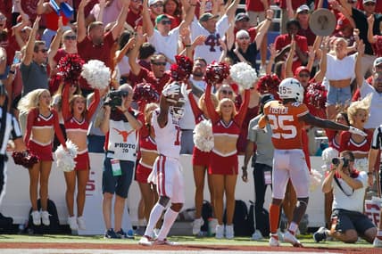 Oklahoma's Marvin Mims (17) celebrates beside Texas' B.J. Foster (25) after catching a pass for a touchdown during the Red River Showdown college football game between the University of Oklahoma Sooners (OU) and the University of Texas (UT) Longhorns at the Cotton Bowl in Dallas, Saturday, Oct. 9, 2021.  Oklahoma won 55-48.

cover main
