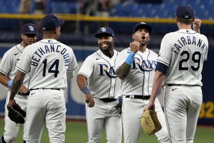 Sep 7, 2022; St. Petersburg, Florida, USA; Tampa Bay Rays relief pitcher Pete Fairbanks (29) (right) is congratulated by left fielder David Peralta (6) (second from right) and right fielder Manuel Margot (13) after the Rays defeated the Boston Red Sox at Tropicana Field. Mandatory Credit: Dave Nelson-USA TODAY Sports