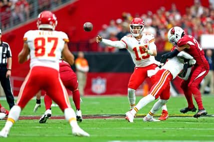 Sep 11, 2022; Glendale, Arizona, USA; Kansas City Chiefs quarterback Patrick Mahomes (15) pass the ball to tight end Travis Kelce (87) during the first half against the Arizona Cardinals at State Farm Stadium. Mandatory Credit: Mark J. Rebilas-USA TODAY Sports