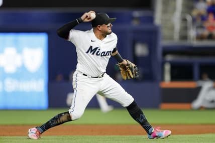 Sep 19, 2022; Miami, Florida, USA; Miami Marlins shortstop Miguel Rojas (11) throws to first base to for an out during the fifth inning at loanDepot Park. Mandatory Credit: Sam Navarro-USA TODAY Sports