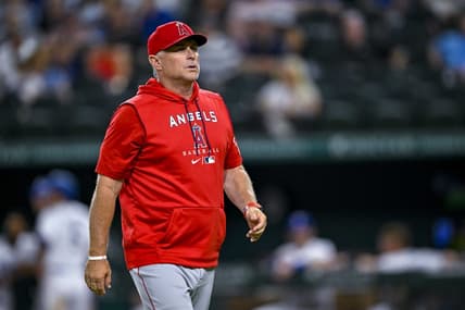 Sep 21, 2022; Arlington, Texas, USA; Los Angeles Angels interim manager Phil Nevin (88) walks back to the dugout during the game between the Texas Rangers and the Los Angeles Angels at Globe Life Field. Mandatory Credit: Jerome Miron-USA TODAY Sports